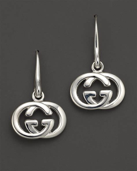 gucci silver dangling earrings.